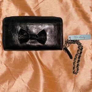 Adorable Kate Landry wrist wallet with bow accent!